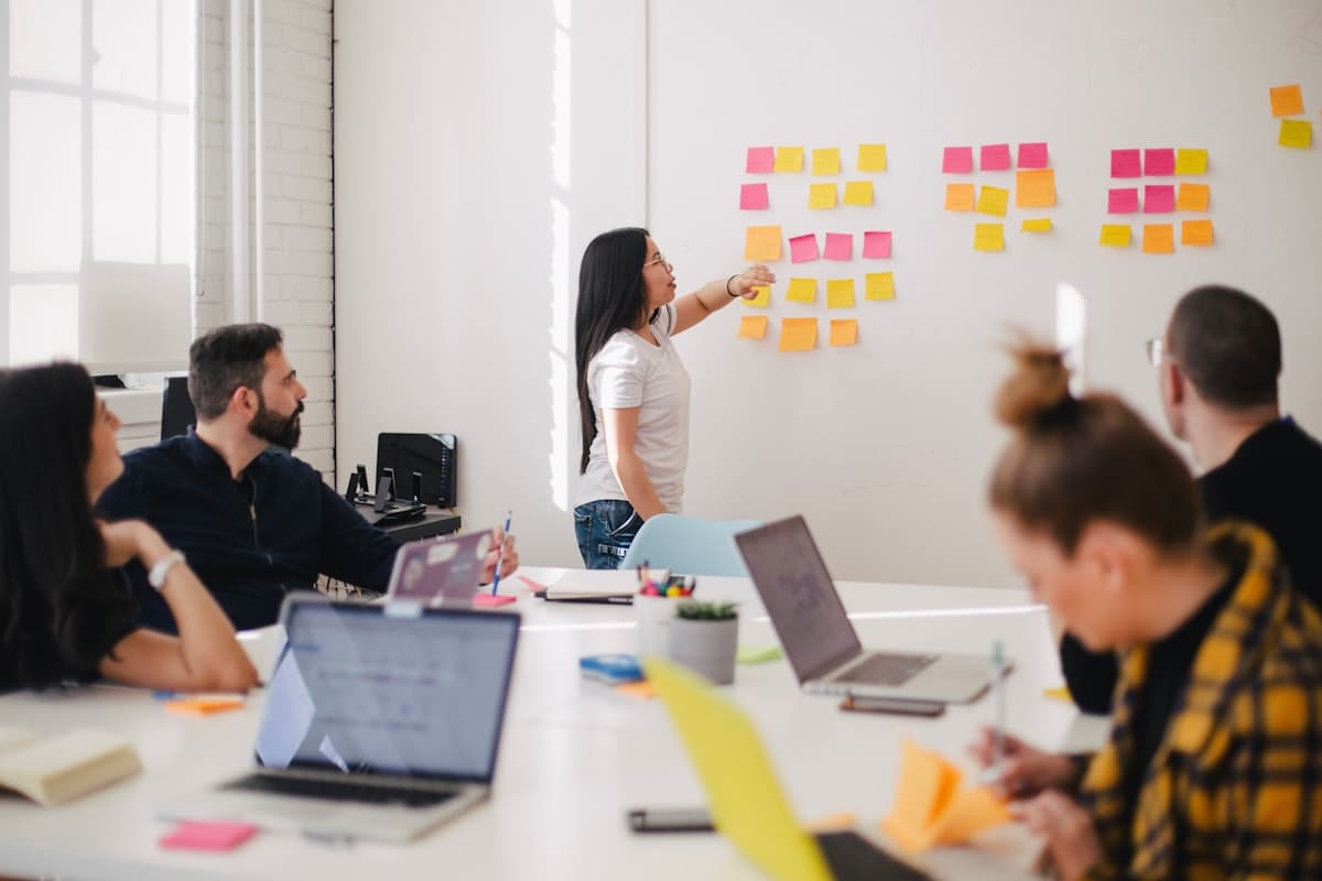 A team working together around a table in a bright office